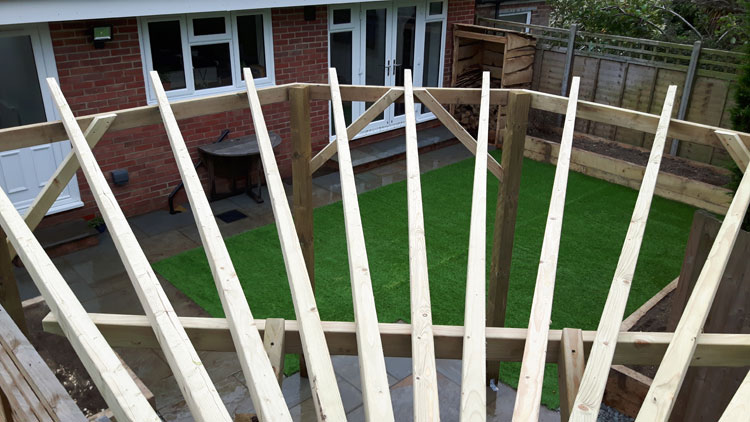 A radial pergola from treated soft wood