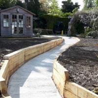 A Chestnut retaining wall and concrete path