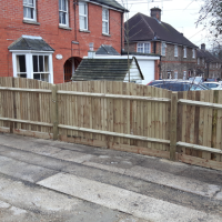 Close boarding fence with e bow top