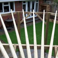 A radial pergola from treated soft wood