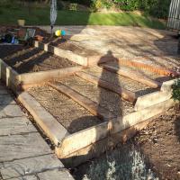 Timber steps and planters from sweet chestnut.